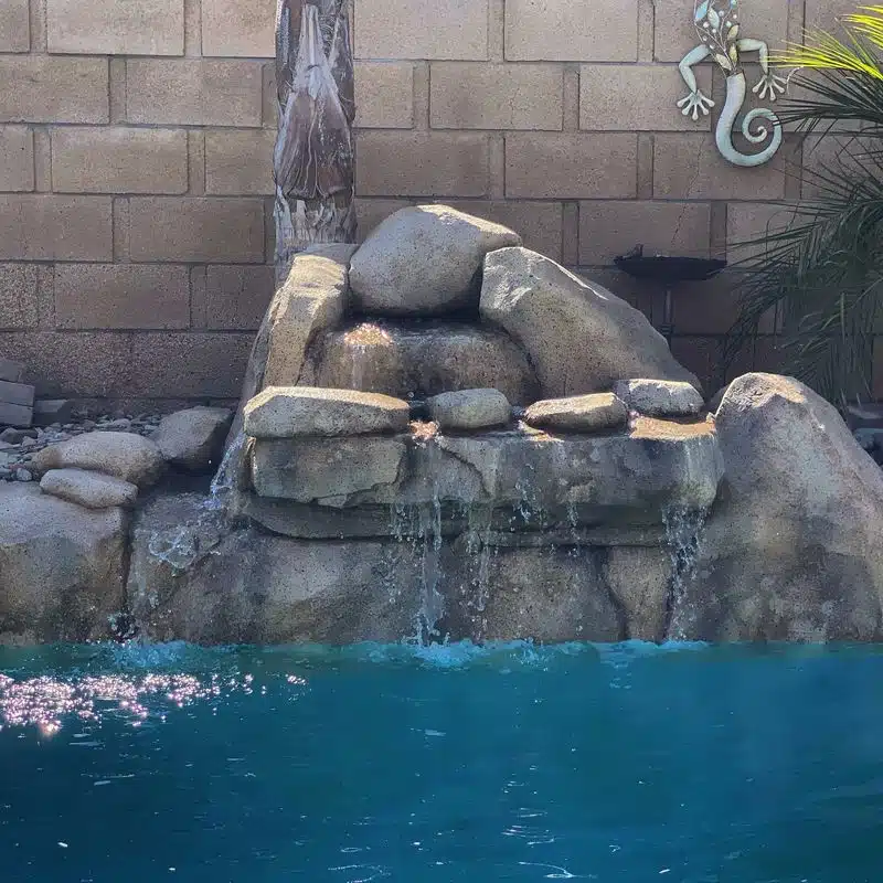 Want a Luxury Spa at Home? Here's a Guide 9 Backyard pool with a water fall