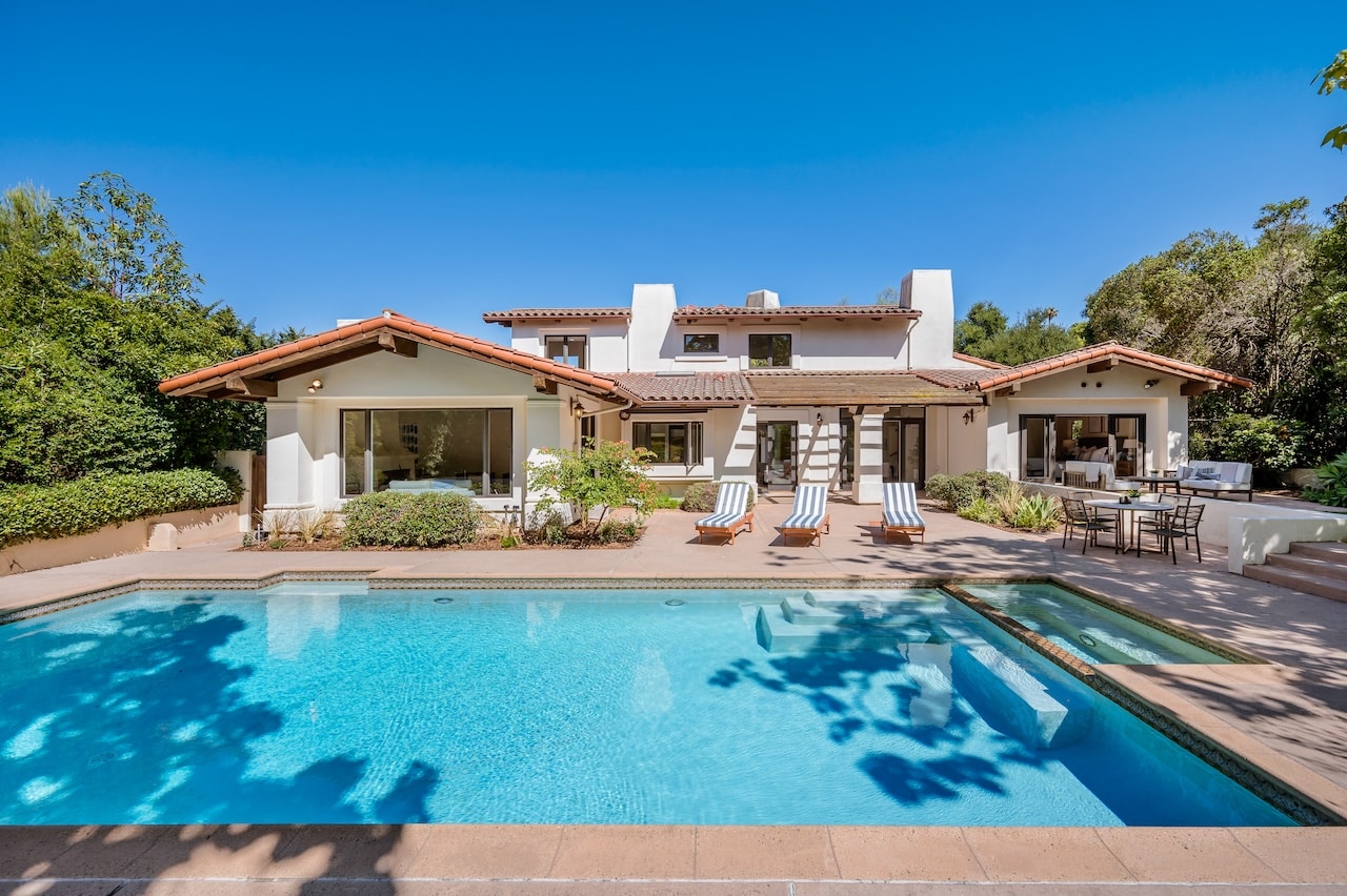 backyard concrete pool in the sunshine