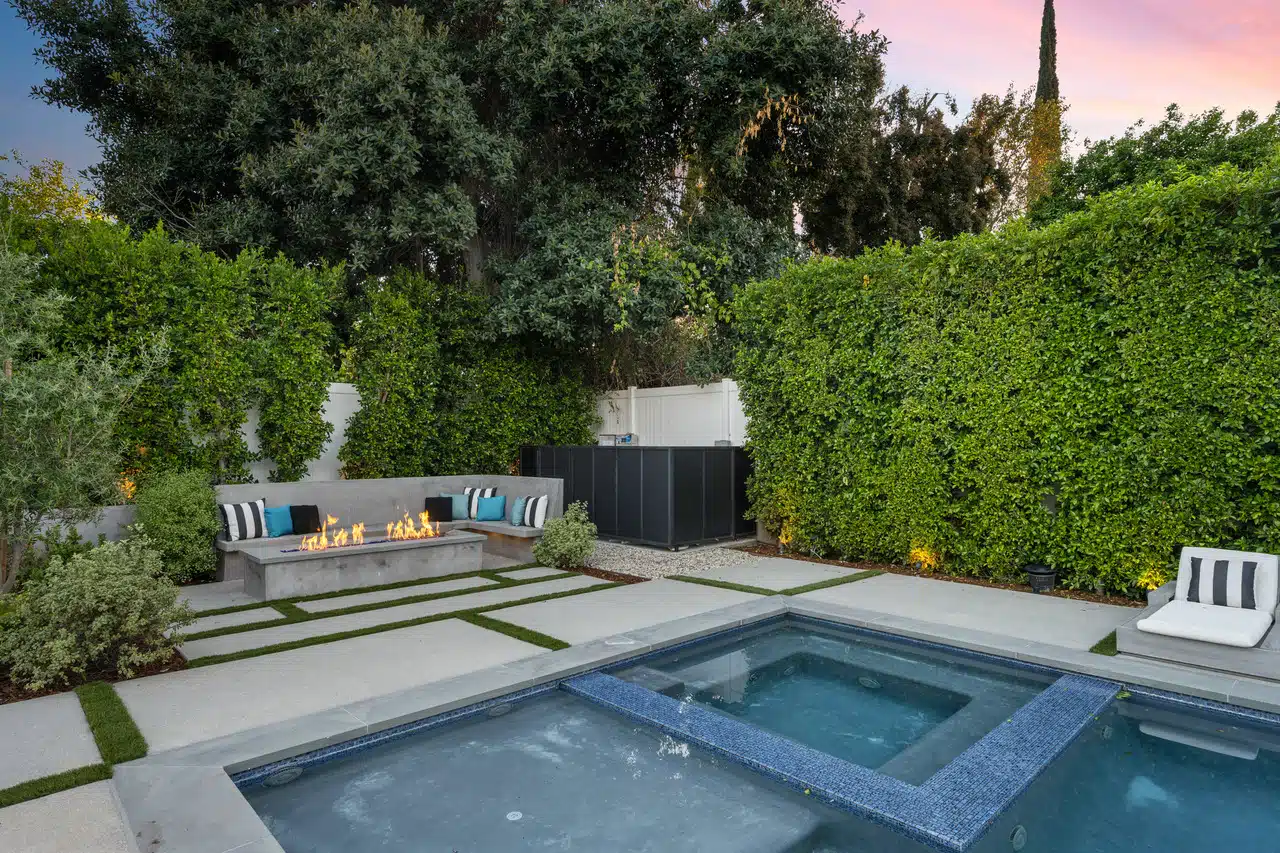 Blog 8 Beautiful outdoor patio featuring pool with hot tub combination