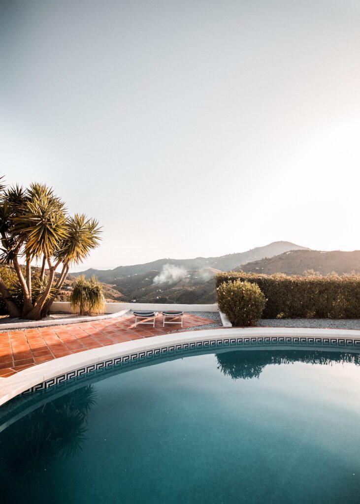 scenic pool on a hill with palm trees
