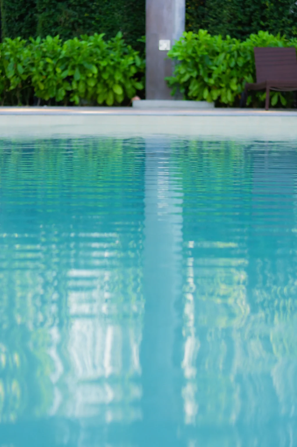 Pool Builder Serving Southern California, Southern Utah and Arizona 8 Southern Utah swimming pool with clear blue water and surrounding greenery